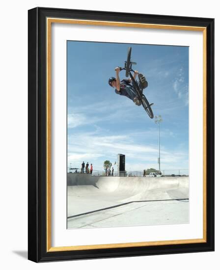 Performing a Bicycle Stunt-null-Framed Photographic Print