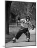 Performing Chimpanzee Zippy Riding on Skates-null-Mounted Photographic Print