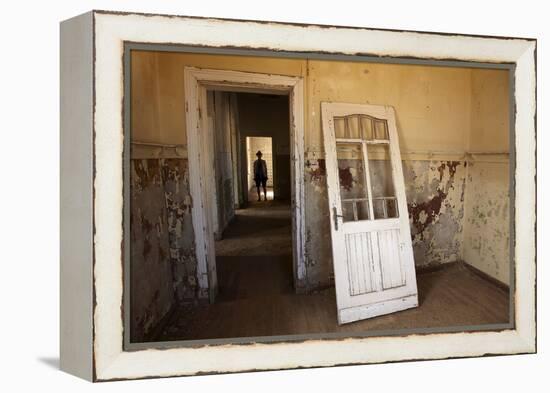 Person in Abandoned House, Kolmanskop Ghost Town, Namibia-David Wall-Framed Premier Image Canvas