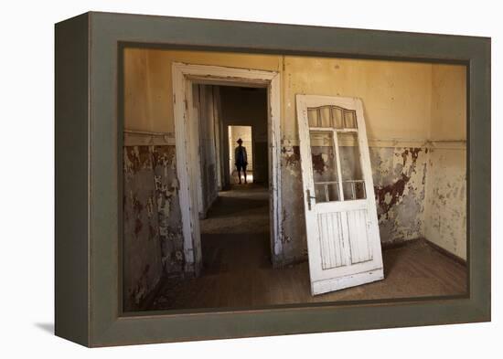 Person in Abandoned House, Kolmanskop Ghost Town, Namibia-David Wall-Framed Premier Image Canvas