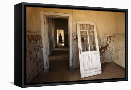 Person in Abandoned House, Kolmanskop Ghost Town, Namibia-David Wall-Framed Premier Image Canvas