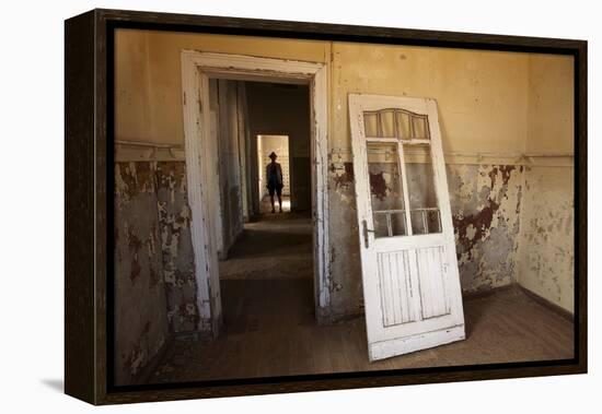 Person in Abandoned House, Kolmanskop Ghost Town, Namibia-David Wall-Framed Premier Image Canvas