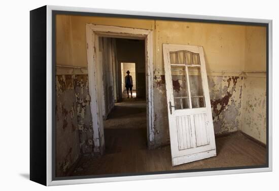 Person in Abandoned House, Kolmanskop Ghost Town, Namibia-David Wall-Framed Premier Image Canvas