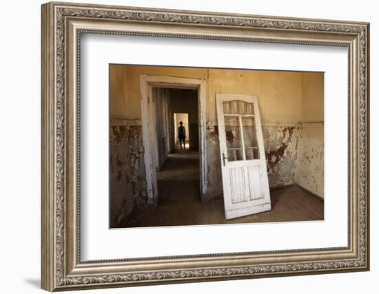 Person in Abandoned House, Kolmanskop Ghost Town, Namibia-David Wall-Framed Photographic Print