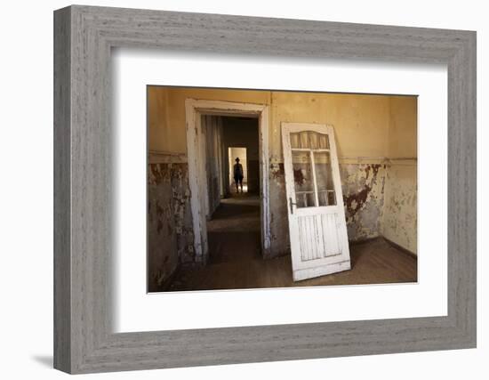 Person in Abandoned House, Kolmanskop Ghost Town, Namibia-David Wall-Framed Photographic Print