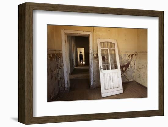 Person in Abandoned House, Kolmanskop Ghost Town, Namibia-David Wall-Framed Photographic Print