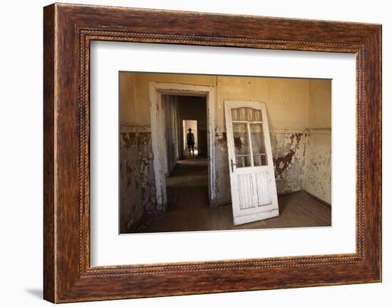 Person in Abandoned House, Kolmanskop Ghost Town, Namibia-David Wall-Framed Photographic Print