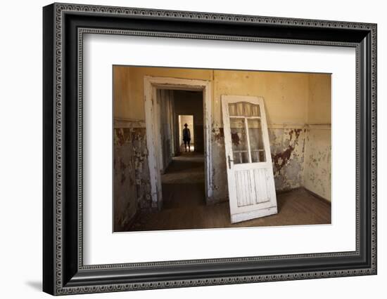 Person in Abandoned House, Kolmanskop Ghost Town, Namibia-David Wall-Framed Premium Photographic Print