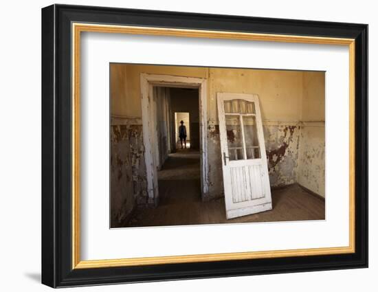 Person in Abandoned House, Kolmanskop Ghost Town, Namibia-David Wall-Framed Premium Photographic Print