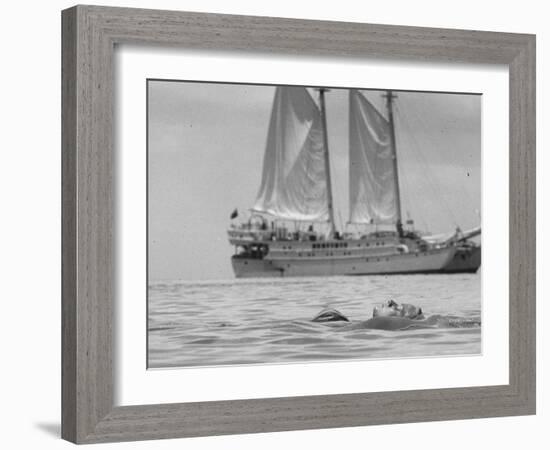 Person on Vacation in the Caribbean Sea in Front of a Catamaran-Michael Rougier-Framed Photographic Print