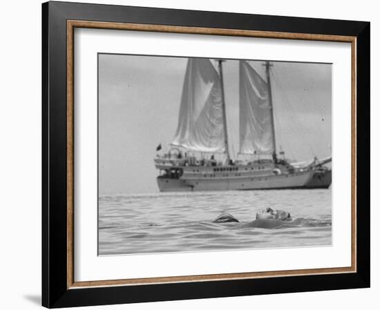 Person on Vacation in the Caribbean Sea in Front of a Catamaran-Michael Rougier-Framed Photographic Print