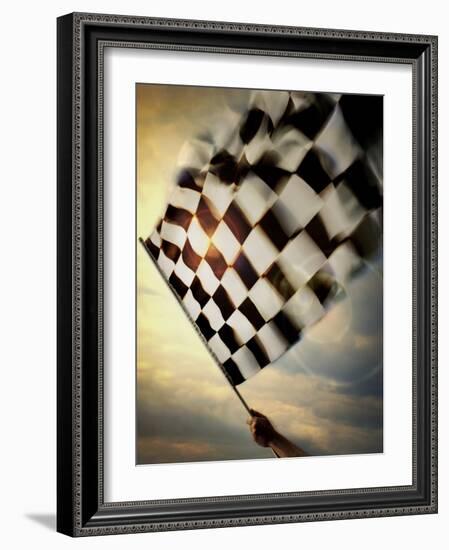 Person's Hand Waving a Checkered Flag--Framed Photographic Print