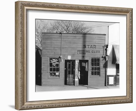 person shop fronts in Vicksburg, Mississippi, 1936-Walker Evans-Framed Photographic Print