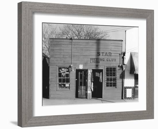 person shop fronts in Vicksburg, Mississippi, 1936-Walker Evans-Framed Photographic Print