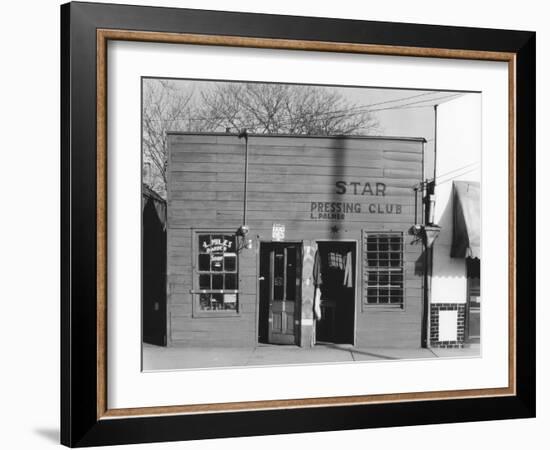 person shop fronts in Vicksburg, Mississippi, 1936-Walker Evans-Framed Photographic Print