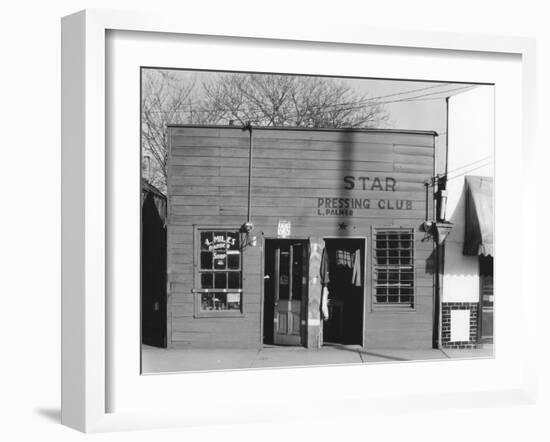 person shop fronts in Vicksburg, Mississippi, 1936-Walker Evans-Framed Photographic Print