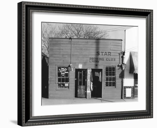 person shop fronts in Vicksburg, Mississippi, 1936-Walker Evans-Framed Photographic Print