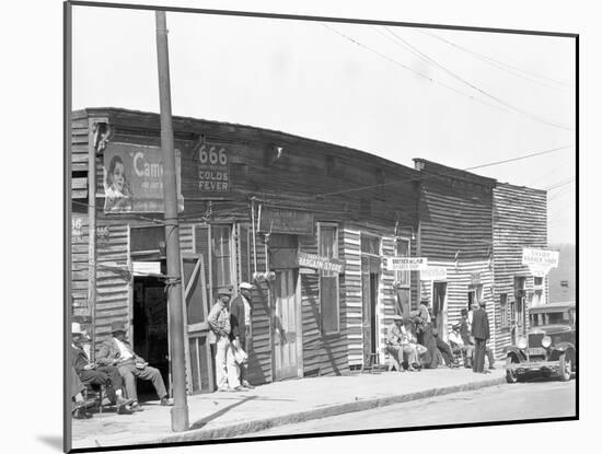 person shop fronts in Vicksburg, Mississippi, 1936-Walker Evans-Mounted Photographic Print