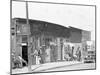 person shop fronts in Vicksburg, Mississippi, 1936-Walker Evans-Mounted Photographic Print