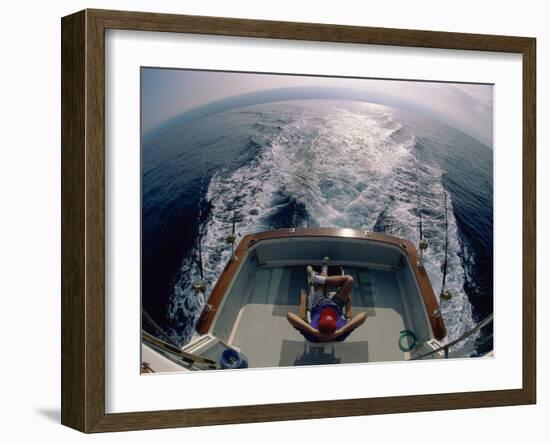 Person Sitting in a Boat-null-Framed Photographic Print