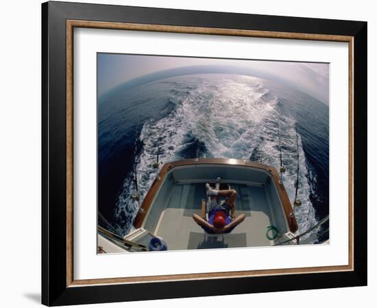 Person Sitting in a Boat-null-Framed Photographic Print