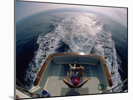 Person Sitting in a Boat-null-Mounted Photographic Print