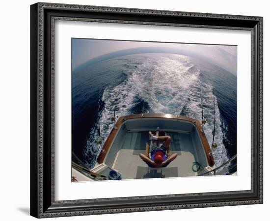 Person Sitting in a Boat-null-Framed Photographic Print