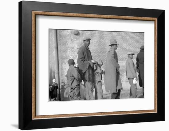 persones in the lineup for food at mealtime in the flood refugee camp, Forrest City, Arkansas-Walker Evans-Framed Photographic Print