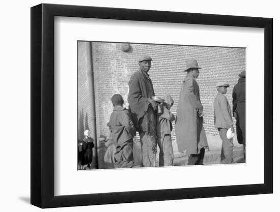 persones in the lineup for food at mealtime in the flood refugee camp, Forrest City, Arkansas-Walker Evans-Framed Photographic Print