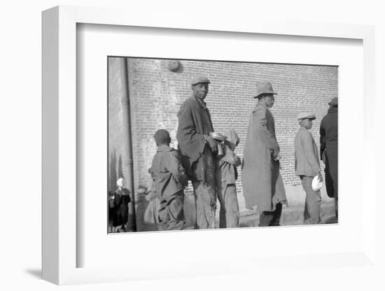 persones in the lineup for food at mealtime in the flood refugee camp, Forrest City, Arkansas-Walker Evans-Framed Photographic Print