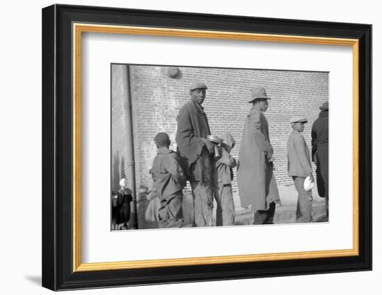 persones in the lineup for food at mealtime in the flood refugee camp, Forrest City, Arkansas-Walker Evans-Framed Photographic Print