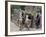 Peru, Native Indian Women Lead their Llamas Past the Ruins of Saqsaywaman-Nigel Pavitt-Framed Photographic Print