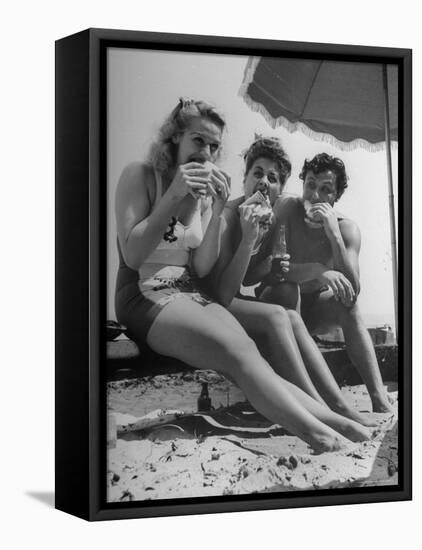 Peter Coe with Martha O'Driscoll Eating Abalone Sandwiches-John Florea-Framed Premier Image Canvas