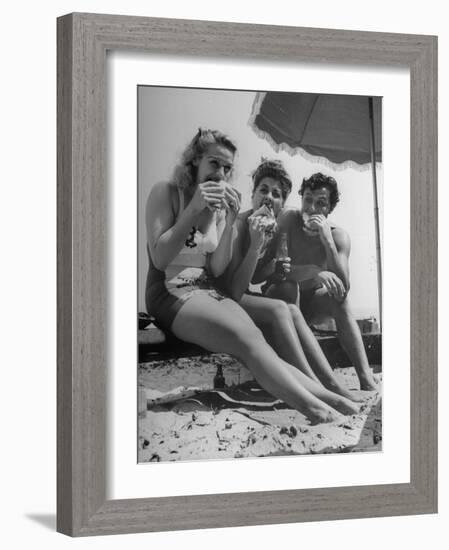 Peter Coe with Martha O'Driscoll Eating Abalone Sandwiches-John Florea-Framed Photographic Print