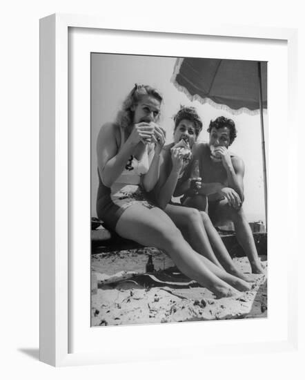 Peter Coe with Martha O'Driscoll Eating Abalone Sandwiches-John Florea-Framed Photographic Print