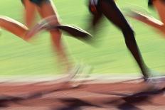 Runners Legs in Motion (Blurred Motion)-Peter Skinner-Photographic Print