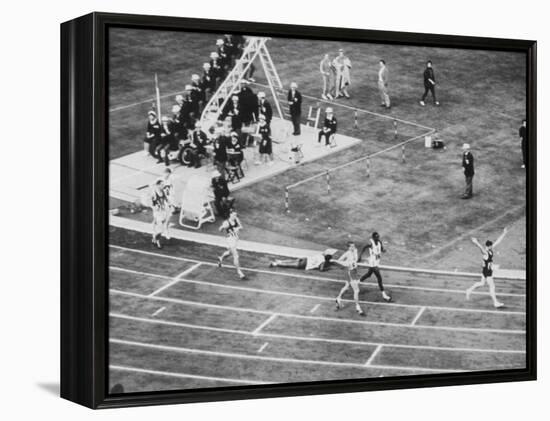 Peter Snell Raising Arms in Celebration After Winning 800 Meter Race at the Summer Olympic Games-George Silk-Framed Premier Image Canvas