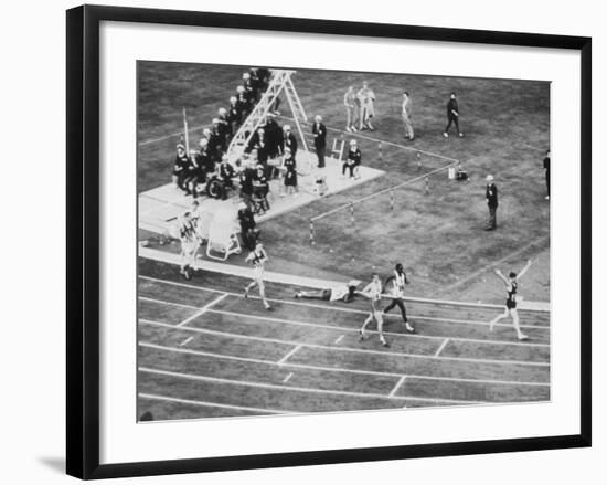 Peter Snell Raising Arms in Celebration After Winning 800 Meter Race at the Summer Olympic Games-George Silk-Framed Premium Photographic Print