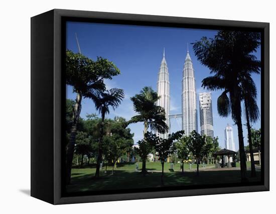 Petronas Twin Towers Seen from Public Park, Kuala Lumpur, Malaysia, Southeast Asia-Charcrit Boonsom-Framed Premier Image Canvas
