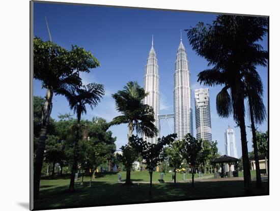 Petronas Twin Towers Seen from Public Park, Kuala Lumpur, Malaysia, Southeast Asia-Charcrit Boonsom-Mounted Photographic Print