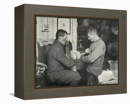 'Petty Officer Evans Binding Up Dr. Atkinson's Hand', 5 July 1911, (1913)-Herbert Ponting-Framed Premier Image Canvas