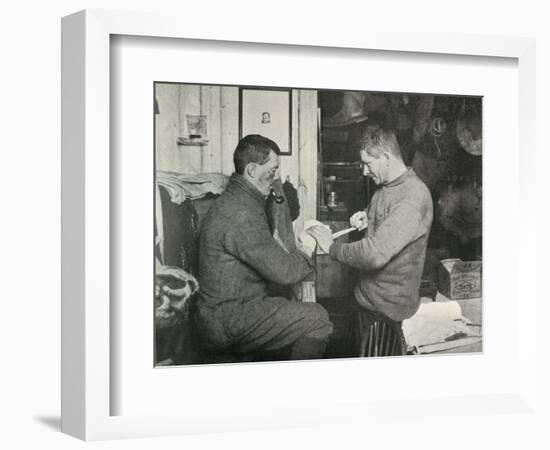 'Petty Officer Evans Binding Up Dr. Atkinson's Hand', 5 July 1911, (1913)-Herbert Ponting-Framed Photographic Print
