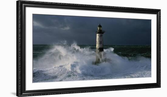 Phare d'Ar-Men lors d'une tempete-Jean Guichard-Framed Art Print