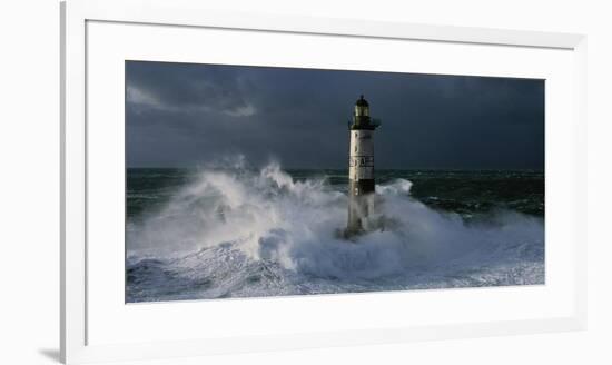 Phare d'Ar-Men lors d'une tempete-Jean Guichard-Framed Art Print