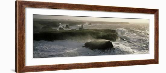 Phare des Poulains lors d'une tempete-Jean Guichard-Framed Art Print