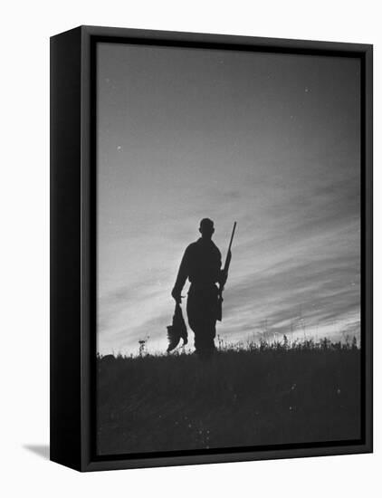 Pheasant Hunter Carrying Bird That He Killed-Wallace Kirkland-Framed Premier Image Canvas