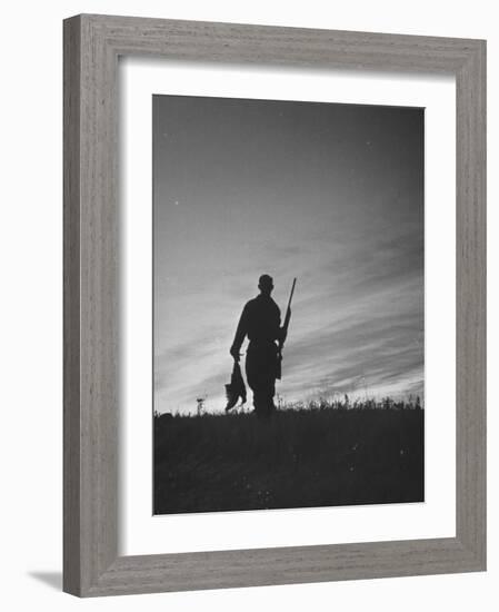 Pheasant Hunter Carrying Bird That He Killed-Wallace Kirkland-Framed Photographic Print