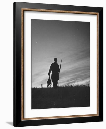 Pheasant Hunter Carrying Bird That He Killed-Wallace Kirkland-Framed Photographic Print