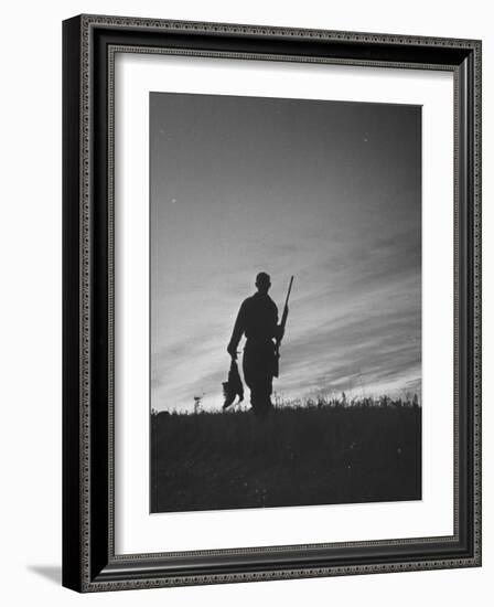 Pheasant Hunter Carrying Bird That He Killed-Wallace Kirkland-Framed Photographic Print