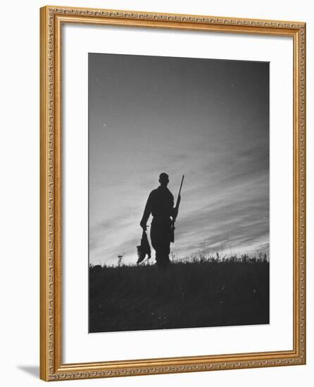 Pheasant Hunter Carrying Bird That He Killed-Wallace Kirkland-Framed Photographic Print